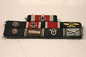 Ordensspange u.a. mit Eichenlaub zum Ritterkreuz, Deutschem Kreuz in Gold, EK1, EK2, Frontflugspange und Verwundetenabzeichen
