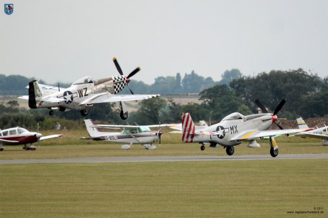 0120_Flying_Legends_2011_North_American_P-51_Mustang_Big_Beautiful_Doll_ZW-I_und_February_MX-I